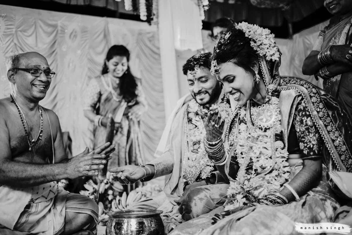 candid wedding moment bride and groom smiling during telugu wedding in bhubaneswar