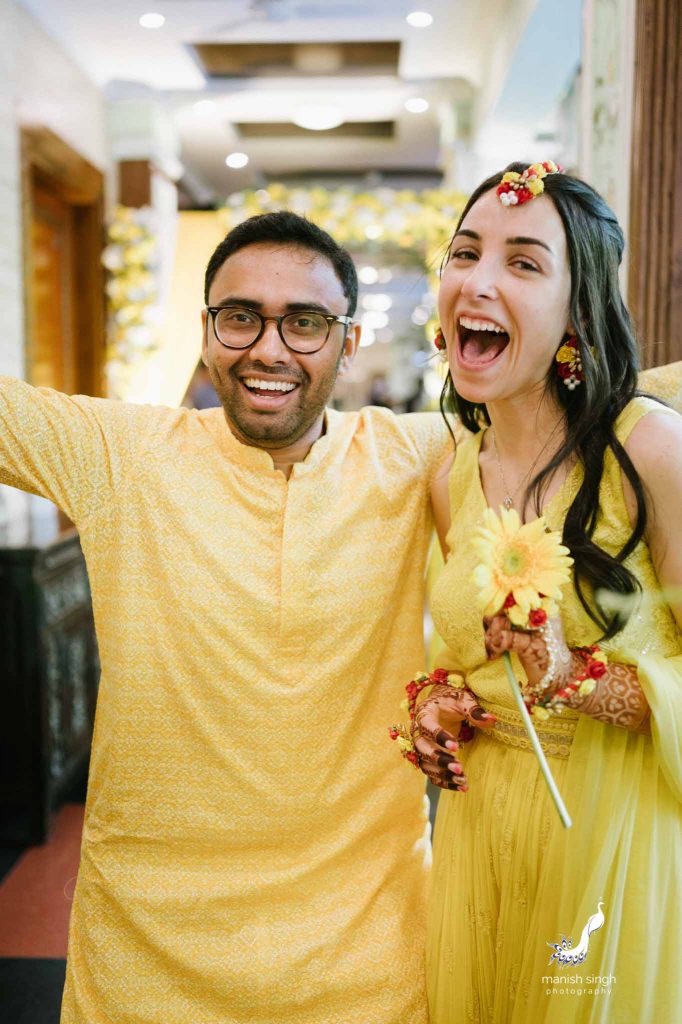 bride and groom having fun in haldi ceremony Mayfair Lagoon Bhubaneswar