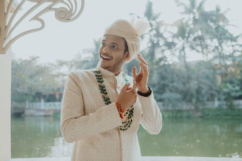 groom's surprise reaction on seeing the bride in front of lake view Mayfair lagoon Bhubaneswar