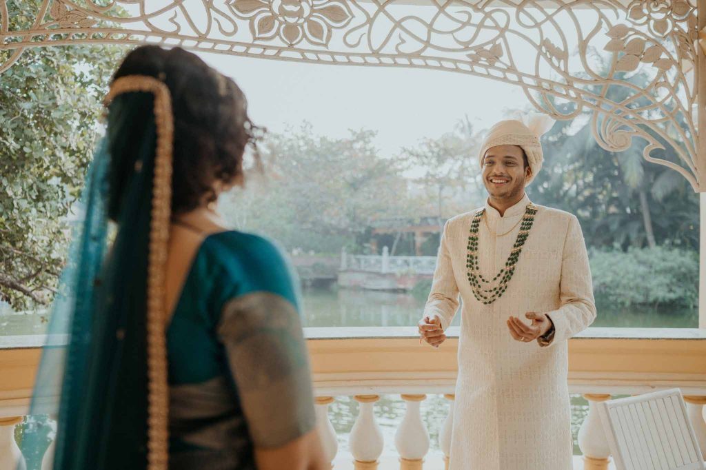 groom's surprise reaction on seeing the bride in front of lake view Mayfair lagoon Bhubaneswar