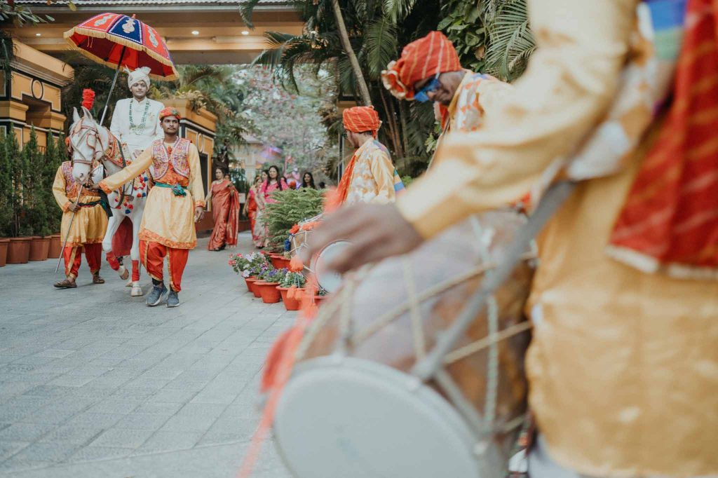 groom on horse during baraat