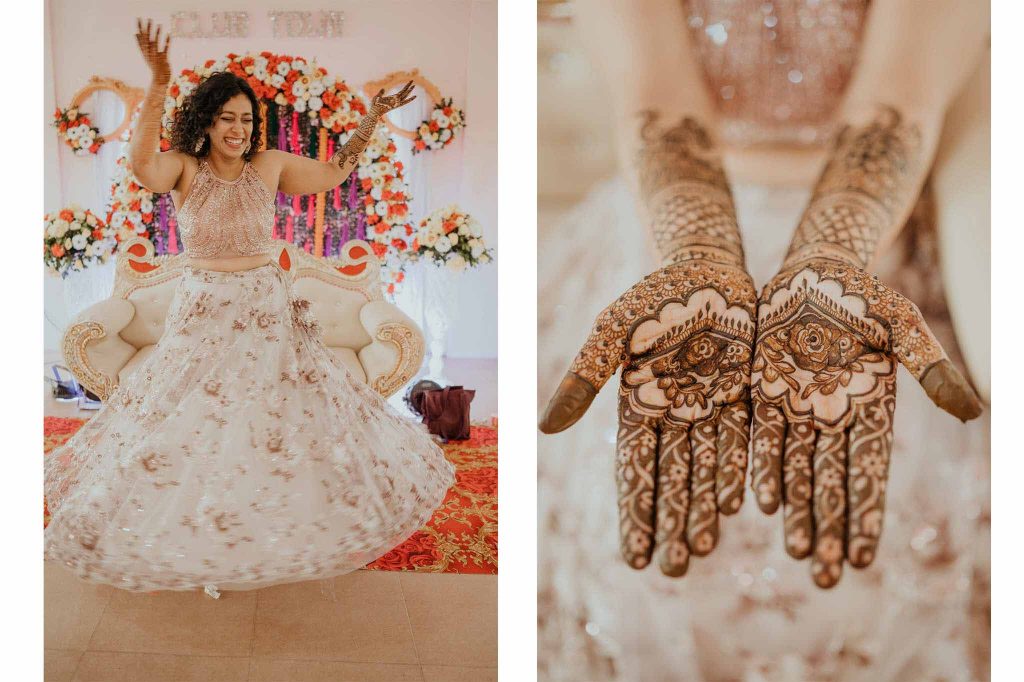 Bride twirl with mehendi on weddding day